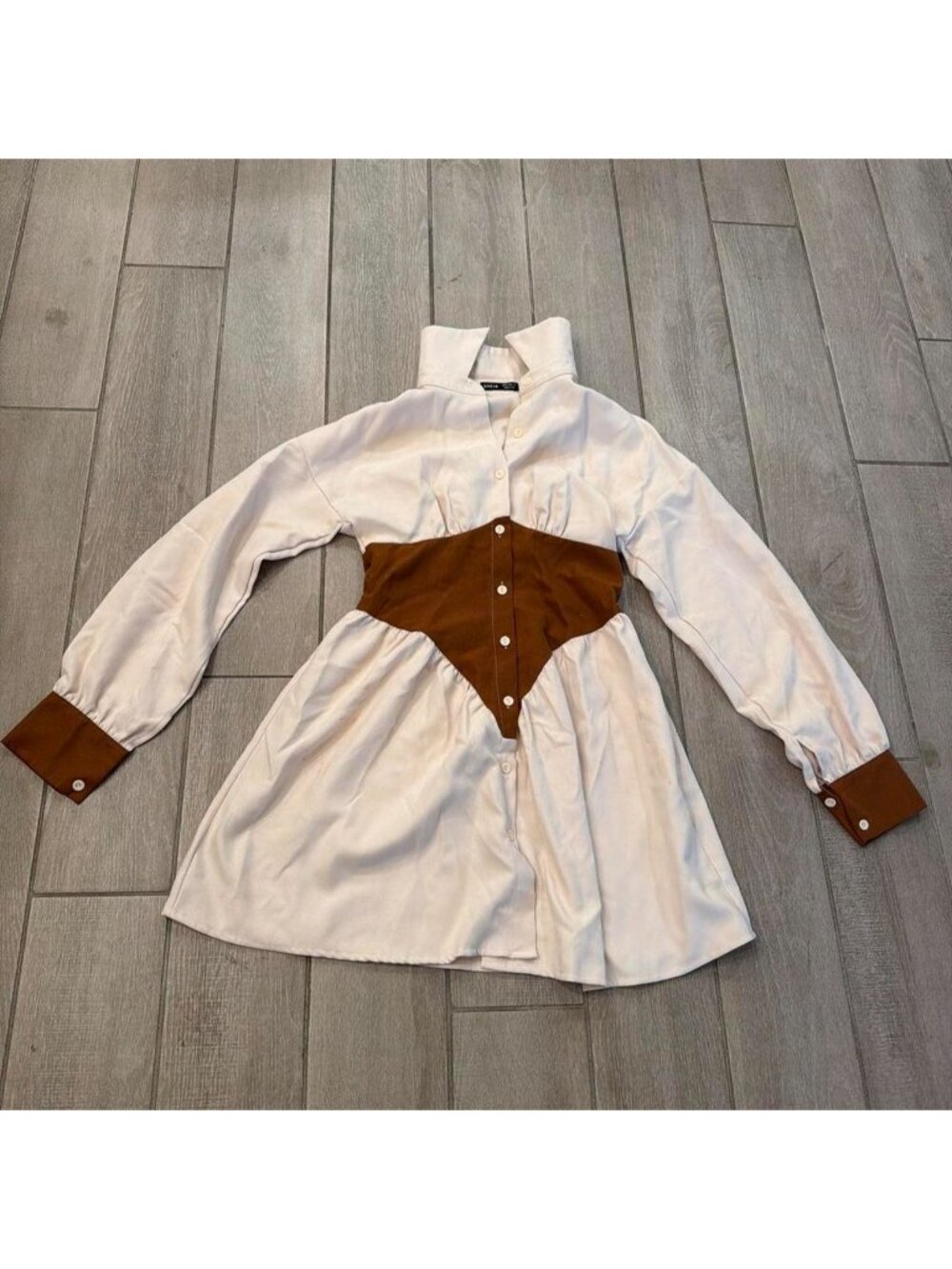White and brown color block mini dress with button-up front and long sleeves